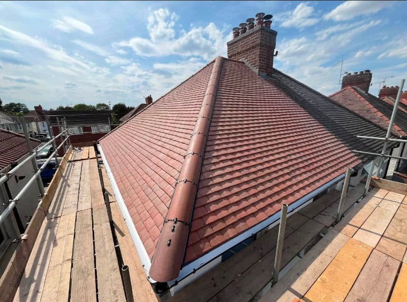 dry-verge-and-ridge-tiles-leicester Dry verge tiles running along the gable edge of a new roof