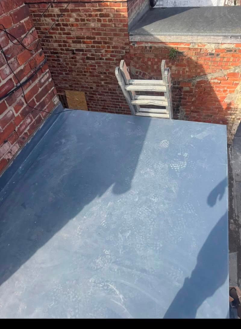 Flat roof partway through installation before the final finish