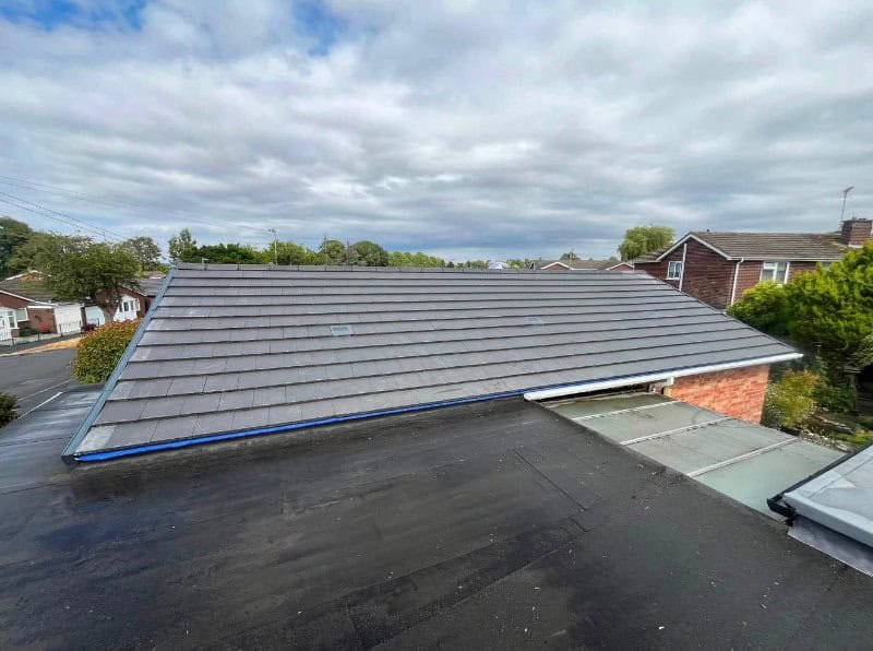 flat-roofing-leicester A flat roof on an extension alongside a pitched roof